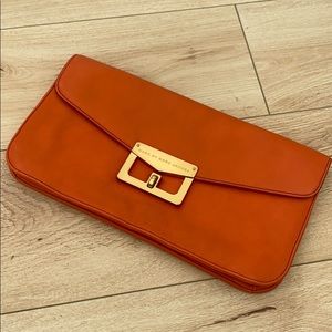 MARC BY MARC JACOBS orange clutch